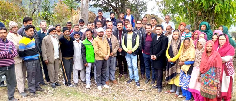 Former Minister and senior Congress leader, Dr Manohar Lal Sharma, posing with locals at a village in Kathua district. Former Minister and senior Congress leader, Dr Manohar Lal Sharma, posing with locals at a village in Kathua district.