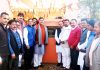 MP Jugal Kishore Sharma and others inaugurating waiting shed near historical Shiv temple at Dansal in Nagrota constituency.