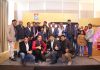 Officials of Red Chief and winners of bullet motorcycles posing for group photograph.