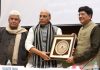Union Minister for Railways and Coal, Piyush Goyal presenting the memento to the Union Home Minister, Rajnath Singh, at the Conference on Railway Security, in New Delhi on Wednesday.