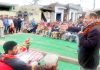 Senior Cong leader M K Bhardwaj addressing a gathering in Bishnah on Sunday.