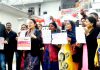 People protesting against deletion of their names in voter list.