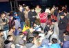 NC leaders meeting stranded passengers at Jammu on Friday.