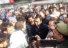 PDP MLC Firdous Tak meeting stranded passengers at Jammu Bus Stand on Friday.