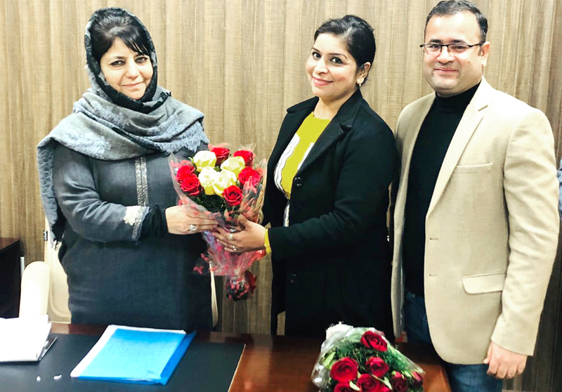 PDP President Mehbooba Mufti felicitating International Gold Medallist Neete Kour. PDP President Mehbooba Mufti felicitating International Gold Medallist Neete Kour.
