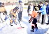 Players in action during Ice Hockey Tournament in Leh.