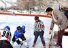 Players in action during 11th CEC Ice Hockey Championship at Kargil.