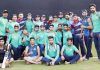 J&K team posing for a group photograph after defeating AP at Vijaywada on Monday.