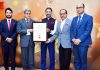 Principal Secretary Health Atal Dulloo receiving SKOCH Award.