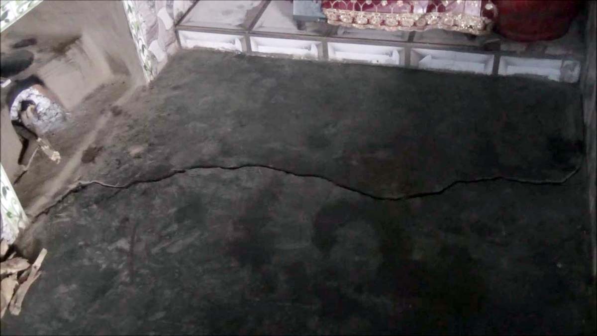 A wide crack on the floor of a house in Halbagan village of Ramsoo. — Excelsior/Shubam Anthal A wide crack on the floor of a house in Halbagan village of Ramsoo. — Excelsior/Shubam Anthal