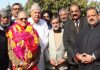NC president Dr Farooq Abdullah posing with B R Kundal after his joining of party on Wednesday.