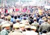 NHM employees staging protest at Bhagat Singh Chowk (Jewel) in Jammu. -Excelsior/Rakesh