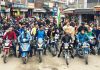 NPP leader Balwant Singh Mankotia leading a bike rally at Udhampur on Monday to protest Pulwama terror attack.