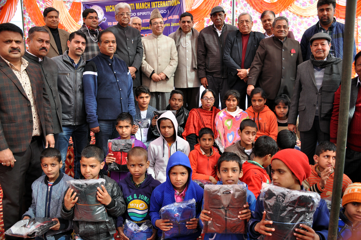 VKMI members and guests with children who were given blankets during a function at Jammu on Sunday. VKMI members and guests with children who were given blankets during a function at Jammu on Sunday.