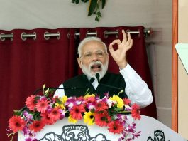 Prime Minister Narendra Modi addresses after inauguration and foundation stone laying ceremony of various development projects,at Barauni in Begusarai district on Sunday. (UNI)