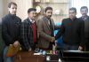 New Director Information Gulzar Ahmed Shabnam with officers of the department.