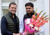 Neeraj Kundan posing for photograph with Congress President Rahul Gandhi before assuming charge of NSUI National President.