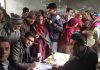 Doctors examining patients at mega medical camp in remote area of Budhal in district Rajouri.