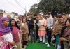 Former Deputy CM, Kavinder Gupta interacting with people in Langar area of Gandhi Nagar constituency on Tuesday.
