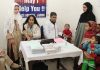 Doctors examining wards of police personnel during medical check-up camp.