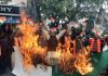 Shiv Sena activists torching Pakistan flag during a protest at Jammu on Wednesday.