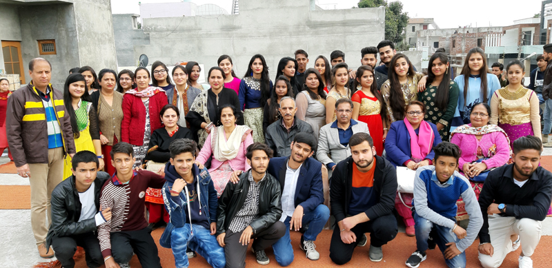 page14-1 Students of HSS Camp Bohri posing along with Principal Bal Ji Thaploo during Annual Day celebration on Tuesday.