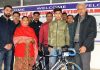 Representatives of District Administration Samba presenting modernised Bi-cycles among outstanding cyclists.
