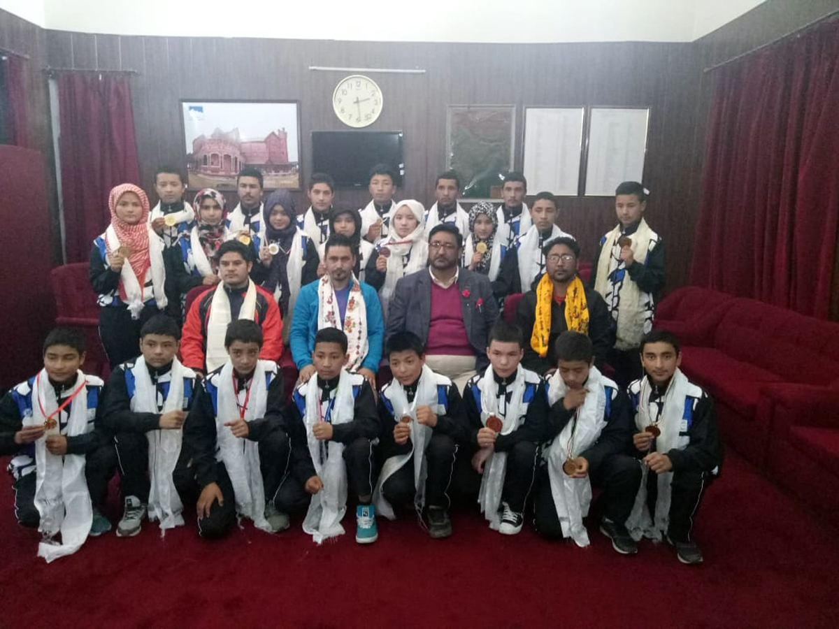 Boxing and Taekwondo players of Kargil posing along with Chairman J&K Legislative Assembly Haji Anayat Ali in Jammu. -Excelsior/Basharat Ladakhi Boxing and Taekwondo players of Kargil posing along with Chairman J&K Legislative Assembly Haji Anayat Ali in Jammu. -Excelsior/Basharat Ladakhi