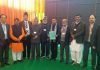 A delegation of Pahari Speaking People posing for a group photograph after meeting PM Modi at Jammu on Sunday.