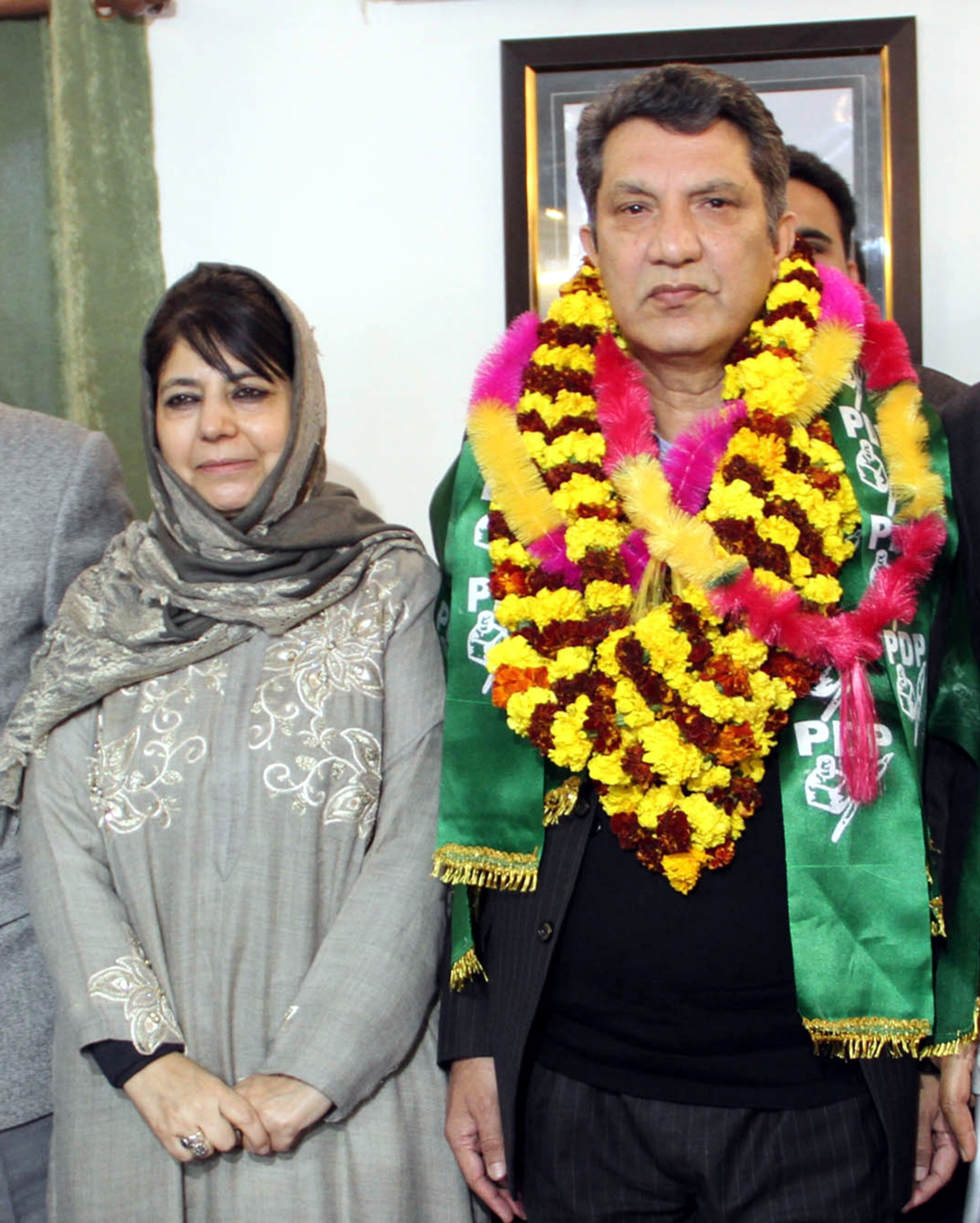 page3 Abdul Qayoom Wani with Mehbooba Mufti after joining PDP on Saturday.