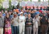 PoK DPs holding a protest demonstration by stapling themselves with steel chains at Jammu. —Excelsior/Rakesh