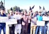 Activists of Confederation protesting at Jammu on Sunday.