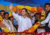 Congress President Rahul Gandhi garlanded during a public meeting at Bhawanipatna, in Kalahandi district.