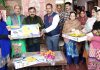 Sourabh Aggarwal, Director Kamdhenu Paints alongwith other officials felicitating a dealer at Jammu.