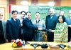 CEO J&K Bank Parvez Ahmed, Managing Director IFFCO-Tokio, Warendra Sinha and others during signing of agreement at Srinagar.
