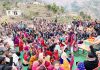 Former Minister & founder head of DSS Ch Lal Singh addressing a public meeting in village Khoon in Billawar on Tuesday.