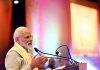 Prime Minister, Narendra Modi addressing the Pravasi Bhartiya representatives at Pravasi Bhartiya Kendra, in New Delhi on Saturday.