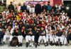 Taekwondo champs posing along with dignitaries and officials in Jammu.