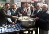 JCMS members distributing Parsad during Basant Panchami celebrations in Jammu.