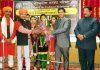 Members of Om Prakash Musical Group being honoured at a cultural programme organized at Dogra Law College in Samba district.