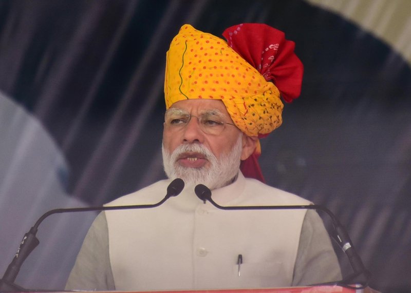 Prime Minister Narendra Modi addressing a public meeting, in Tonk, Rajasthan on Saturday. (UNI) Prime Minister Narendra Modi addressing a public meeting, in Tonk, Rajasthan on Saturday. (UNI)