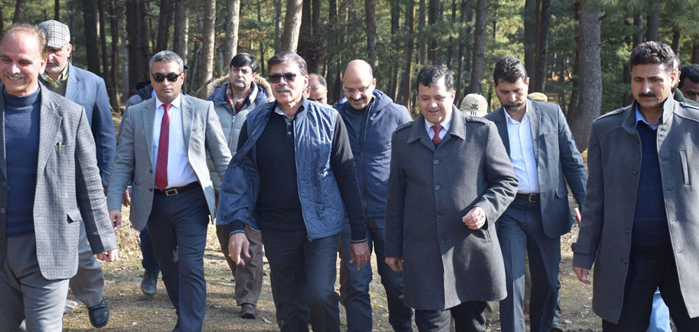 Advisor K Vijay Kumar flanked by officials inspecting Wular Lake Conservation Project on Tuesday. Advisor K Vijay Kumar flanked by officials inspecting Wular Lake Conservation Project on Tuesday.