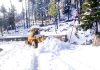 A BRO machine clearing snow on Bhaderwah-Bani Road near Chhatergala. -Excelsior/Tilak Raj