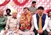 MP, Jugal Kishore Sharma & MLC, Ashok Khajuria during an election meeting at R S Pura on Monday.