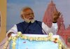 Prime Minister Narendra Modi addressing the foundation stone laying ceremony of Shikshan Bhavan and Vidhyarthi Bhavan, at Adalaj in Gandhinagar on Tuesday. (UNI)