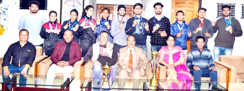 Grappling team posing along with VC Prof Manoj Dhar during felicitation function on Thursday. Grappling team posing along with VC Prof Manoj Dhar during felicitation function on Thursday.