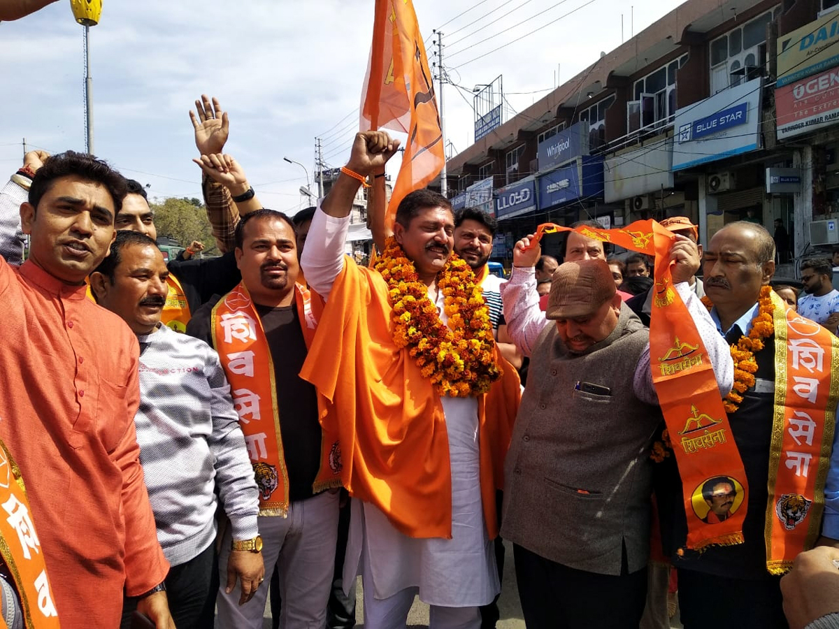 Shiv Sena leader Manish Sahni along with party leaders and his supporters during a rally at Jammu. Shiv Sena leader Manish Sahni along with party leaders and his supporters during a rally at Jammu.