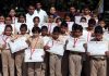 Children displaying certificates after qualifying Belt Grading Test in Jammu.