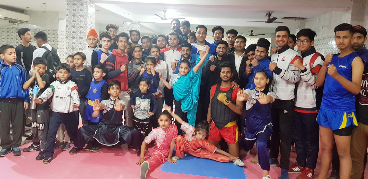 Young sportspersons posing for a group photograph during inaugural function of State Wushu Championship in Jammu. Young sportspersons posing for a group photograph during inaugural function of State Wushu Championship in Jammu.