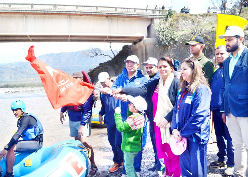 Rafters being flagged off by dignitaries at Reasi on Saturday. Rafters being flagged off by dignitaries at Reasi on Saturday.